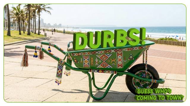 A Zulu-beaded green wheelbarrow on the Durban beachfront promenade, with DURBS! lettering
